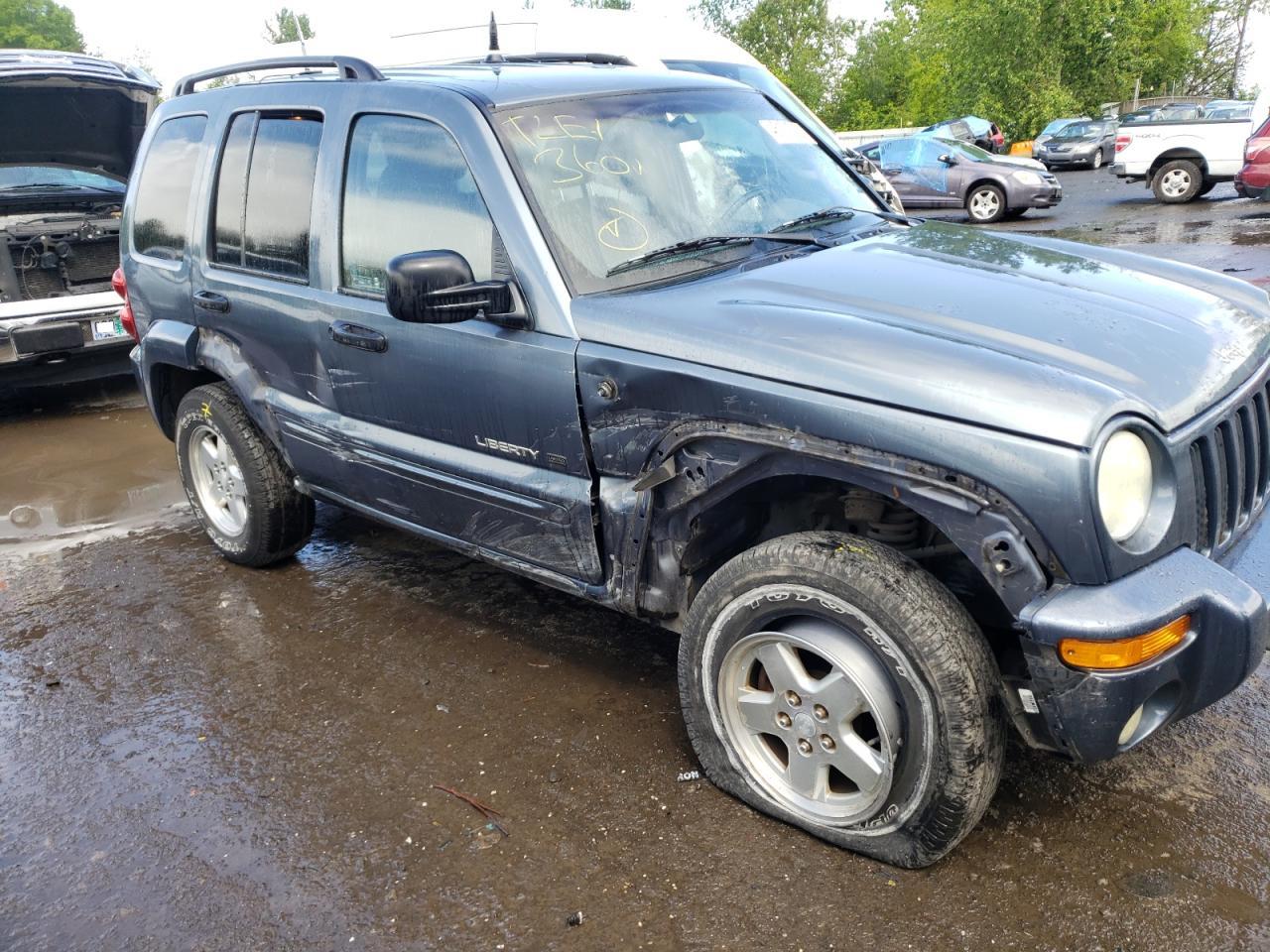 Photo 9 from auction – 2002 JEEP LIBERTY LI with VIN 1J8GL58K12W287799