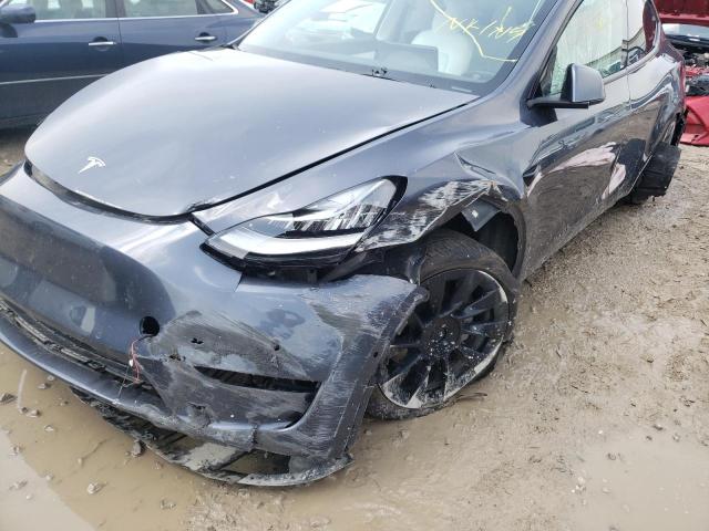 Photo 9 from auction – 2021 TESLA MODEL Y with VIN 5YJYGAEE4MF212691