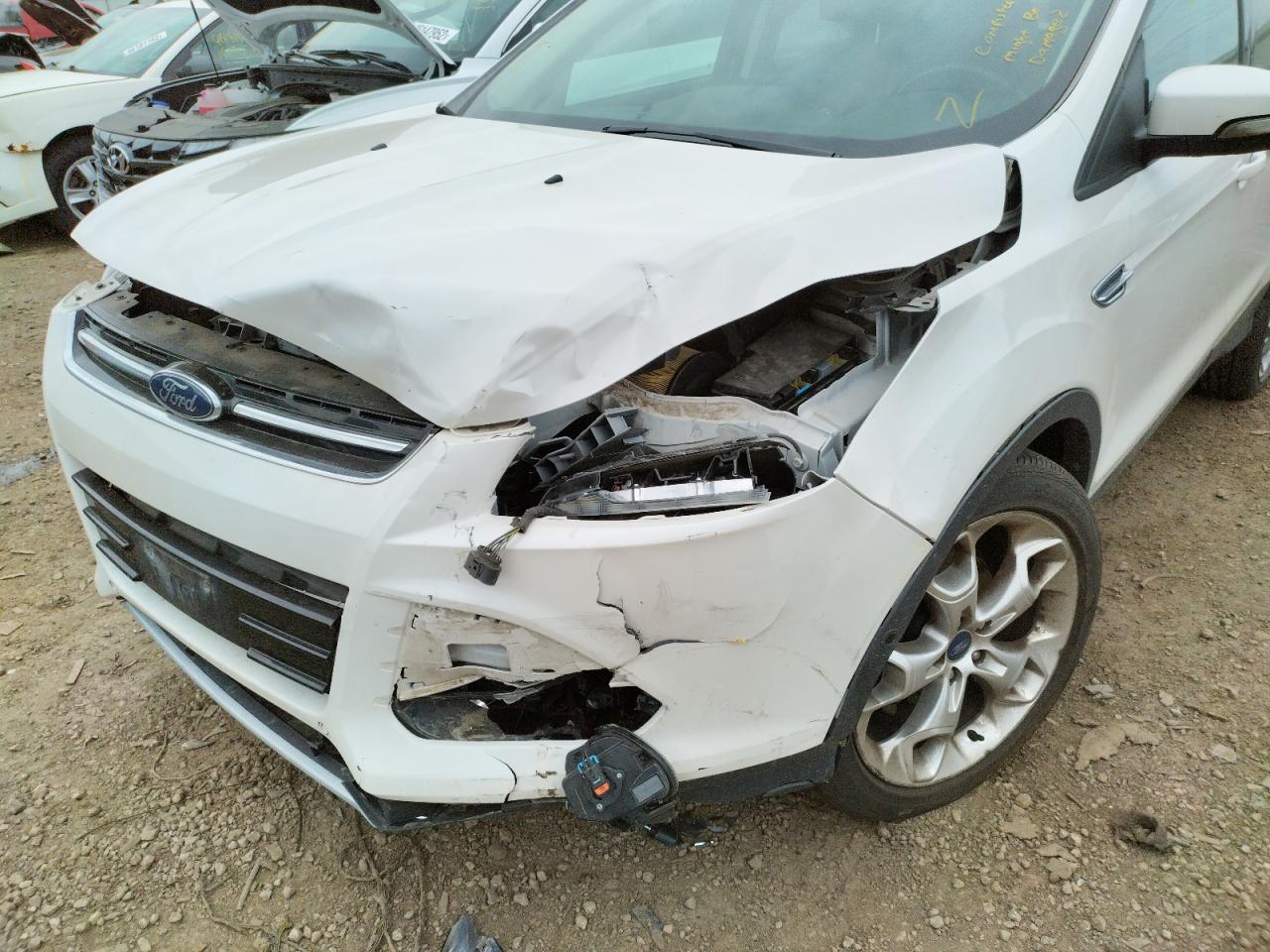 Photo 9 from auction – 2014 FORD ESCAPE TIT with VIN 1FMCU0JX1EUA28088