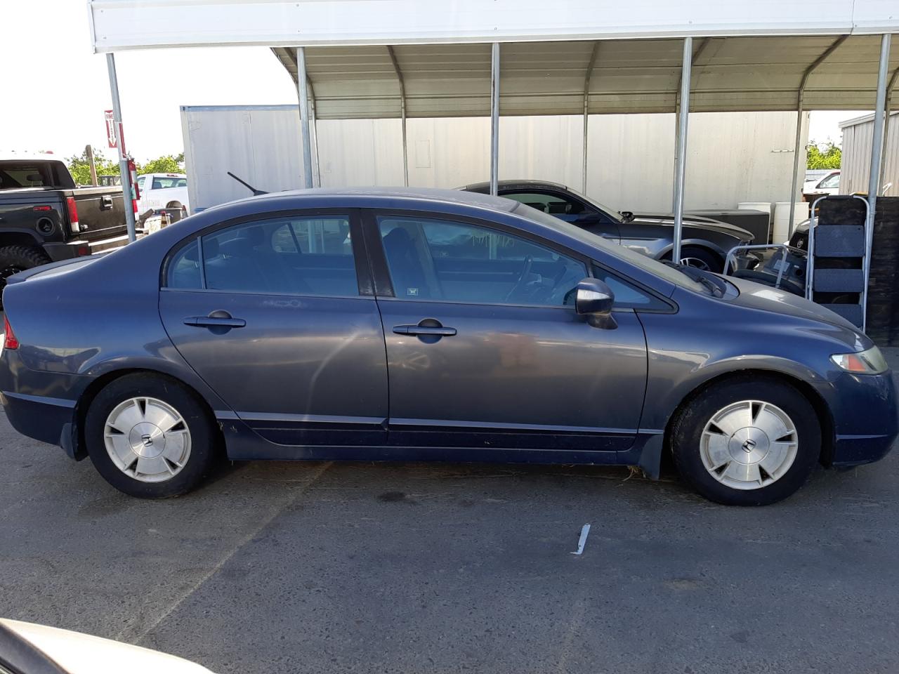 Photo 9 from auction – 2007 HONDA CIVIC HYBR with VIN JHMFA36237S022864