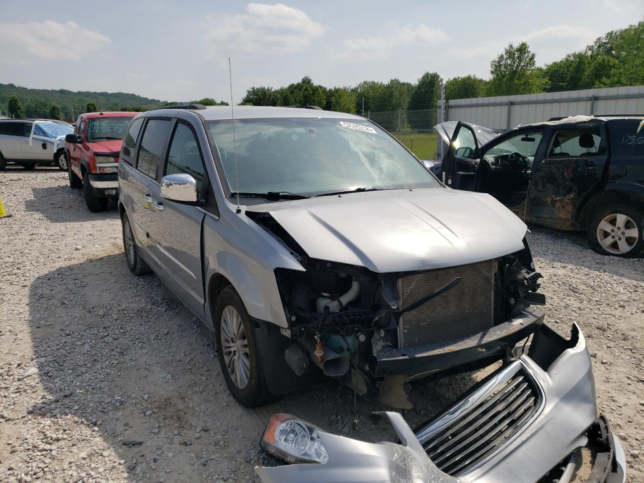 CHRYSLER TOWN & COU 2014 with VIN 2C4RC1CG9ER409706 - Photo from auction