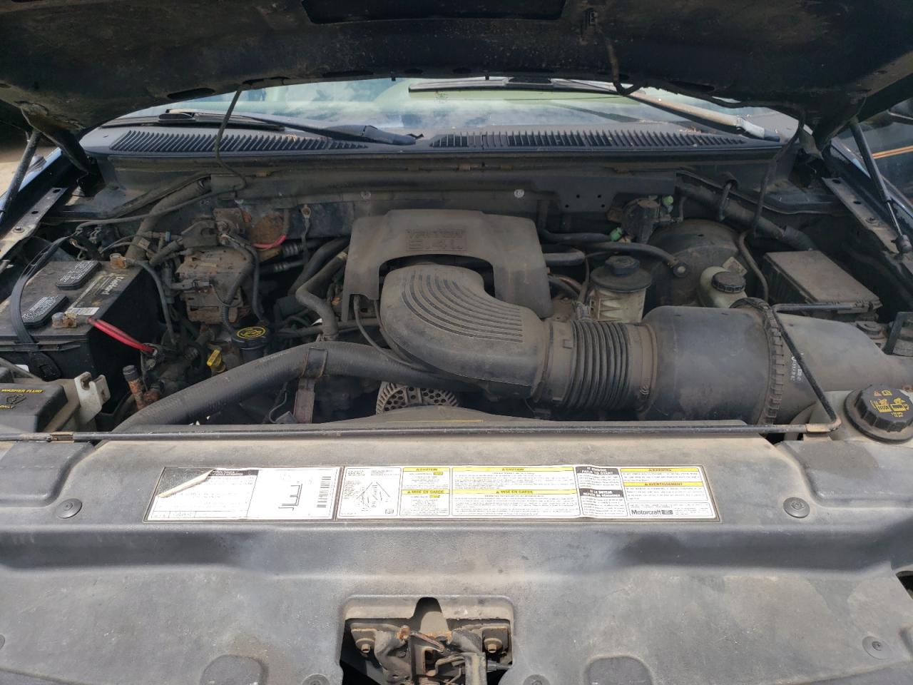 Photo 7 from auction – 2000 FORD F-150 with VIN 1FTRX18L6YNA76313