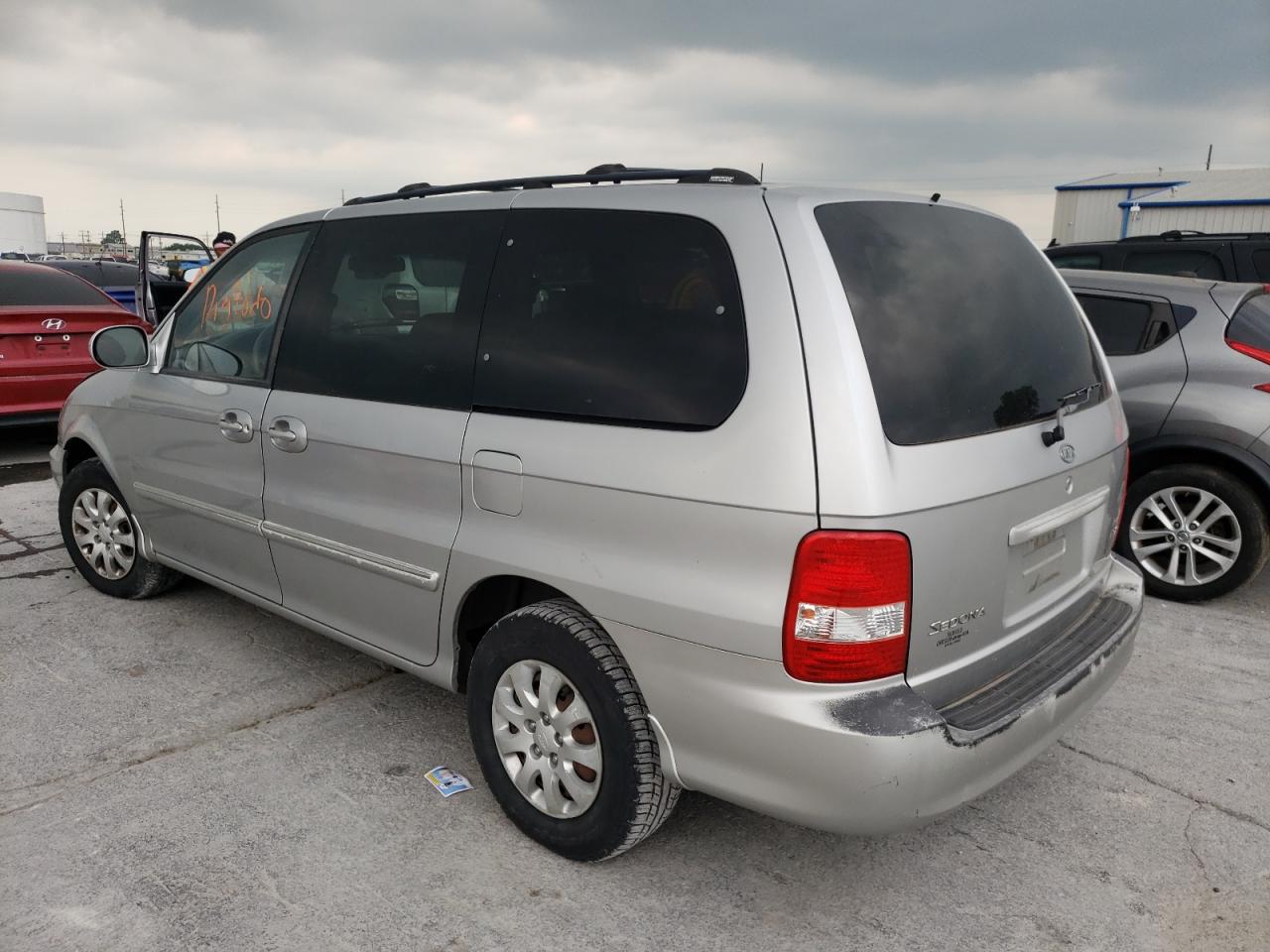 Photo 3 from auction – 2004 KIA SEDONA EX with VIN KNDUP131646542732