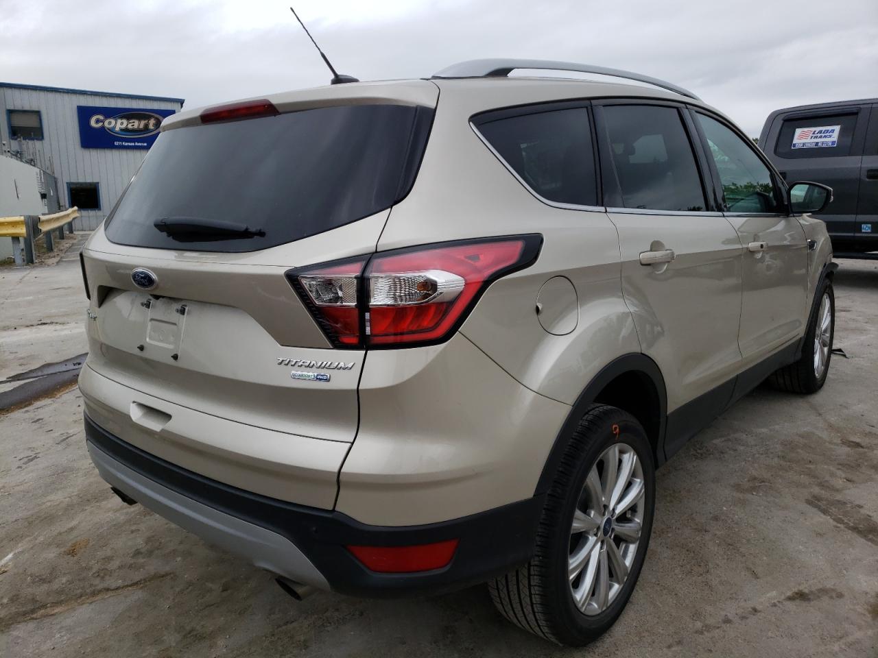 Photo 4 from auction – 2017 FORD ESCAPE TIT with VIN 1FMCU9JD7HUD66111