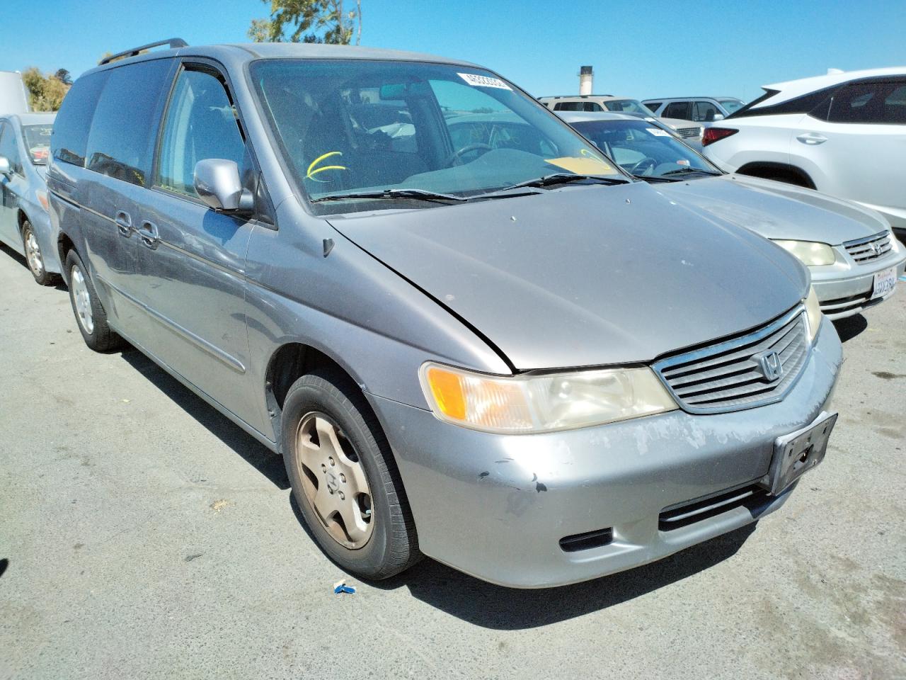 HONDA ODYSSEY EX 2000 with VIN 2HKRL1869YH599766 - Photo from auction