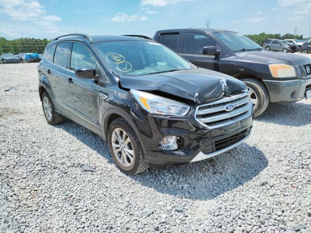 FORD ESCAPE SE 2018 with VIN 1FMCU0GD1JUC58740 - Photo from auction