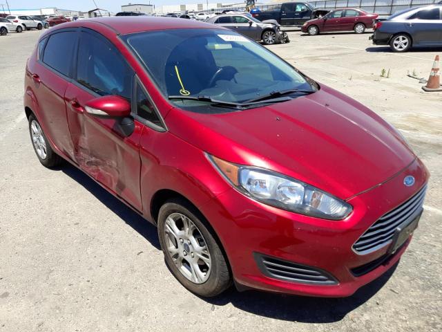 FORD FIESTA SE 2014 with VIN 3FADP4EJ1EM103198 - Photo from auction