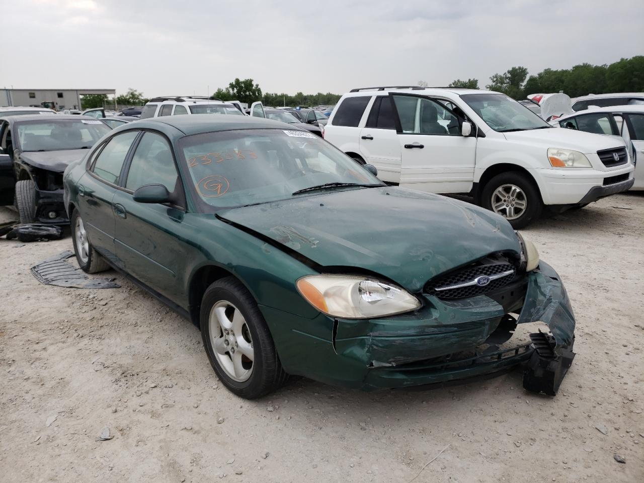 FORD TAURUS SES 2000 with VIN 1FAFP55U0YG233383 - Photo from auction