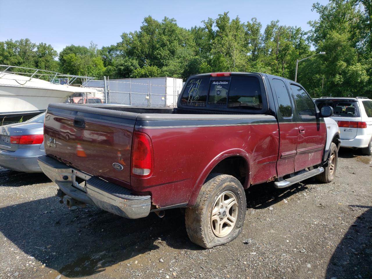 Photo 4 from auction – 2003 FORD F150 with VIN 1FTRX18W43NB09859