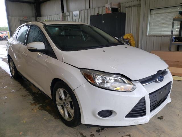 FORD FOCUS SE 2014 with VIN 1FADP3F23EL287790 - Photo from auction