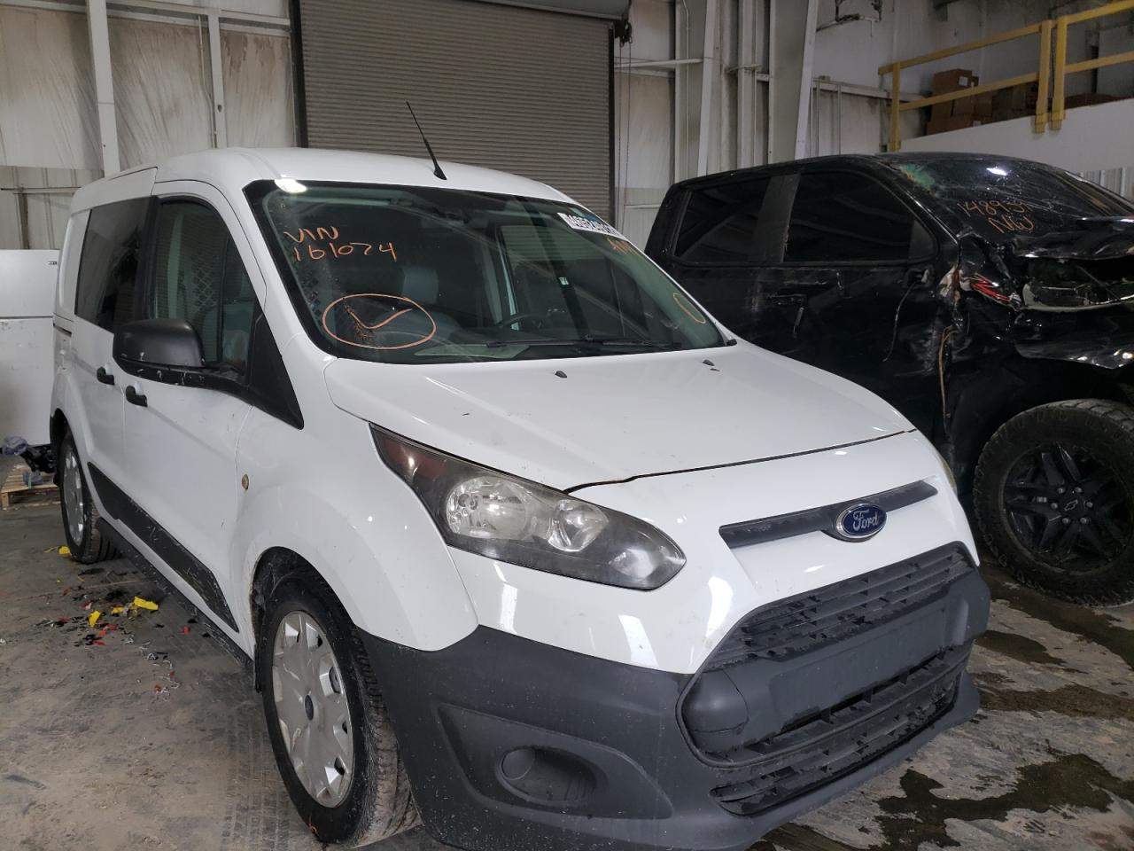 FORD TRANSIT CO 2014 with VIN NM0LS6E70E1161074 - Photo from auction