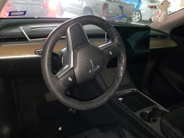 Photo 8 from auction – 2022 TESLA MODEL Y with VIN 7SAYGDEE2NF310477