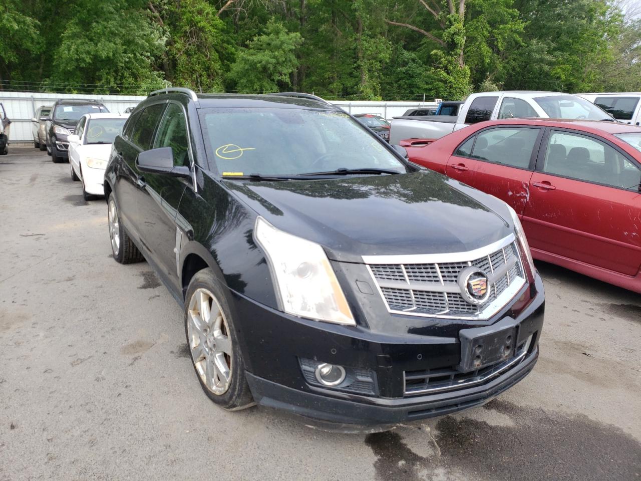 CADILLAC SRX PREMIU 2012 with VIN 3GYFNFE34CS566008 - Photo from auction