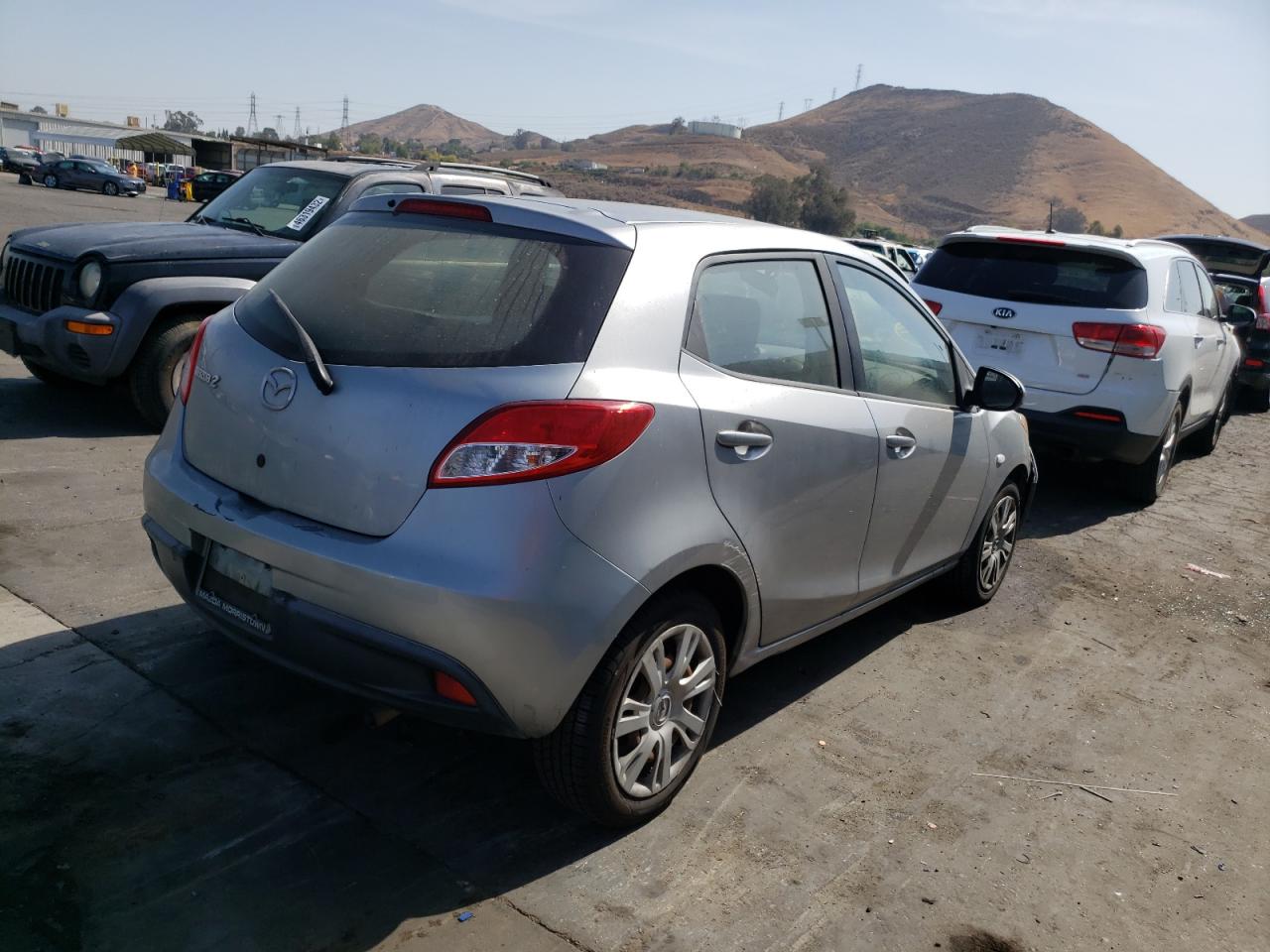 Photo 16 from auction – 2012 MAZDA MAZDA2 with VIN JM1DE1KZ6C0150929