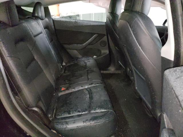 Photo 6 from auction – 2022 TESLA MODEL Y with VIN 7SAYGDEE2NF310477