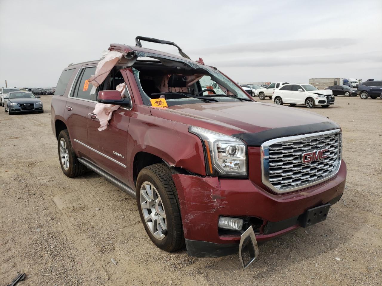 GMC YUKON DENA 2018 with VIN 1GKS2CKJ5JR124129 - Photo from auction