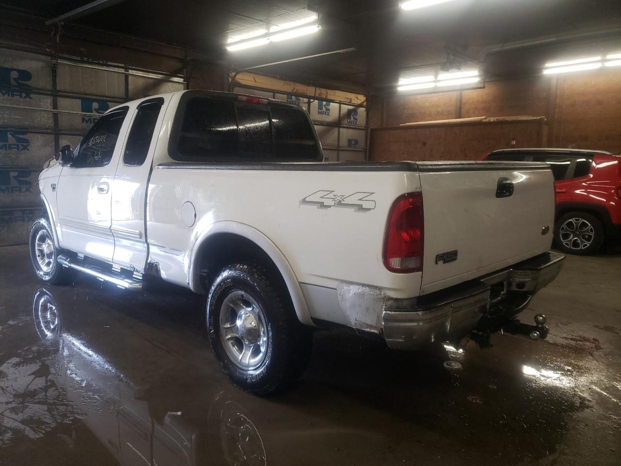 Photo 3 from auction – 2002 FORD F150 with VIN 1FTRX18L92NB51786