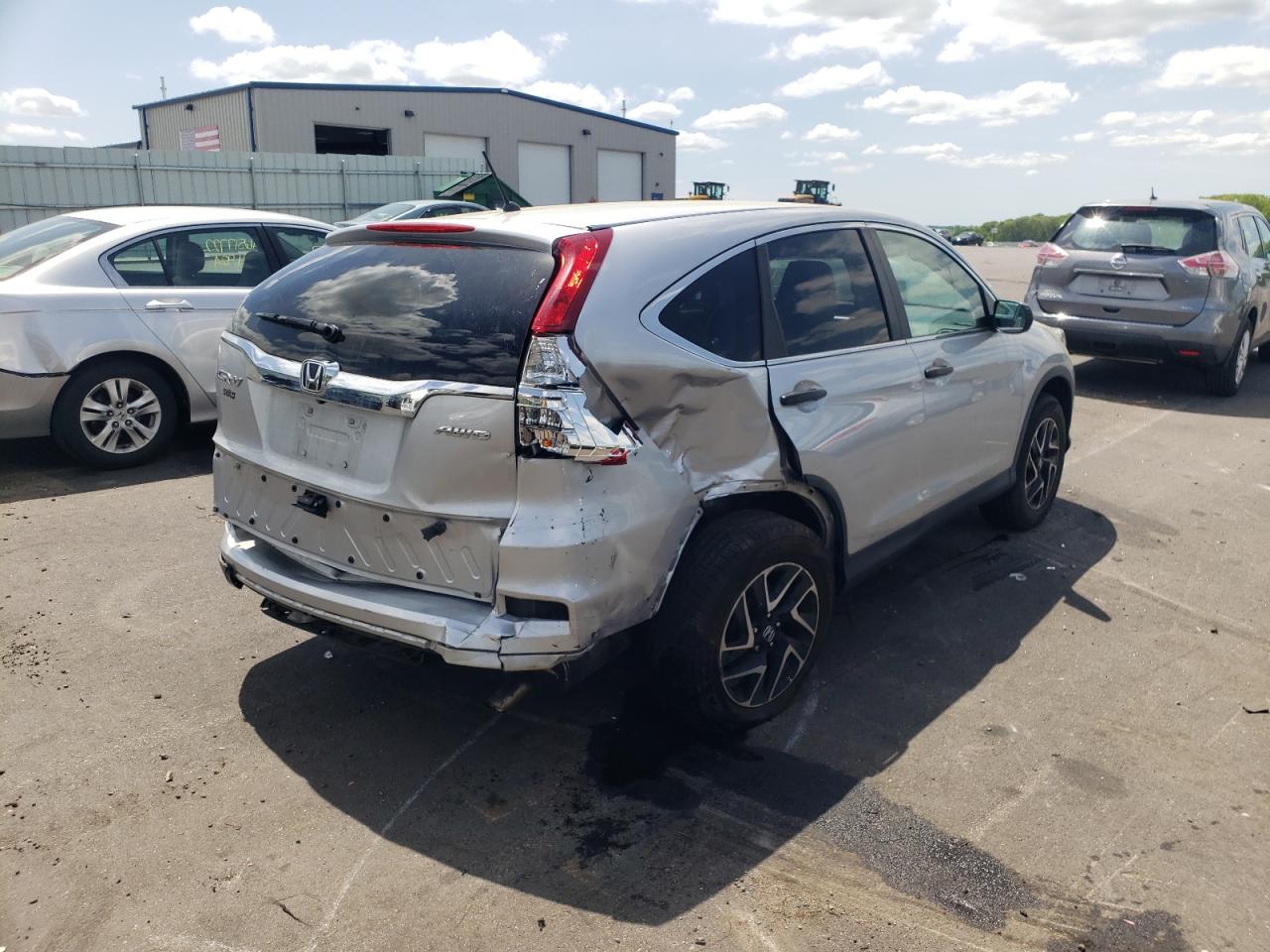 Photo 17 from auction – 2016 HONDA CR-V SE with VIN 5J6RM4H49GL035939