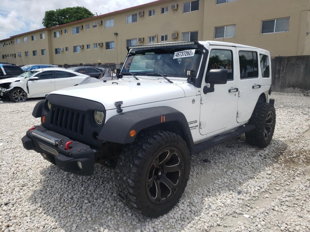 Photo 2 from auction – 2012 JEEP WRANGLER U with VIN 1C4BJWDG6CL135597