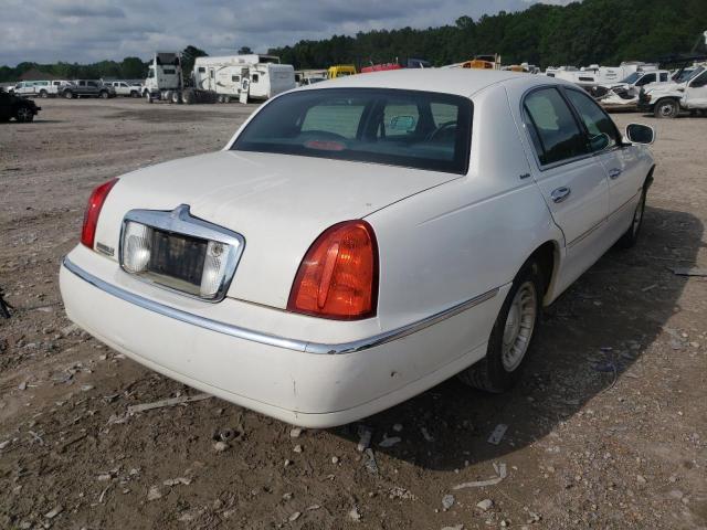 Photo 4 from auction – 2000 LINCOLN TOWN CAR E with VIN 1LNHM81W0YY813792