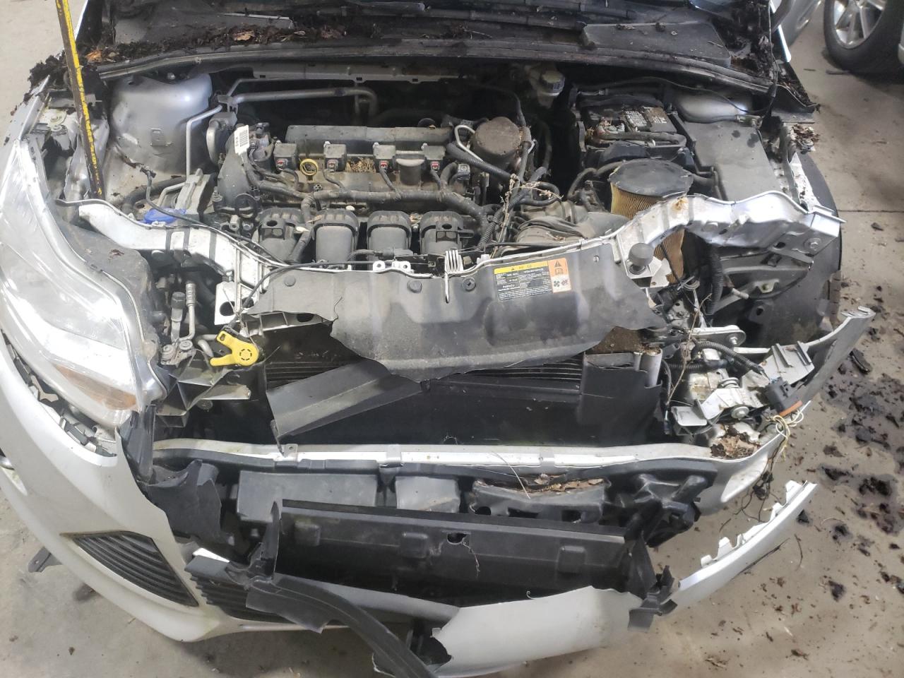 Photo 12 from auction – 2014 FORD FOCUS SE with VIN 1FADP3F20EL131500