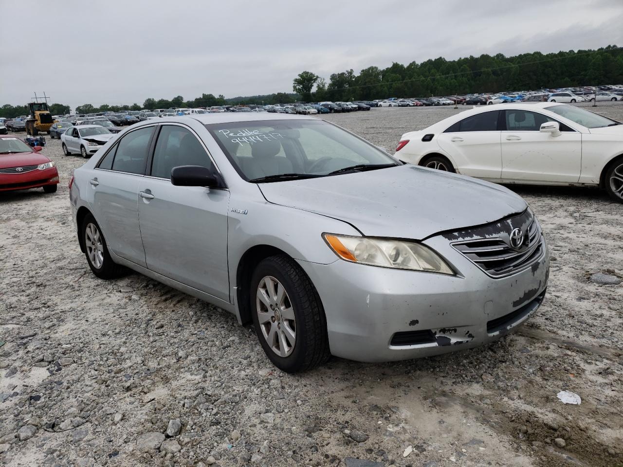 TOYOTA CAMRY HYBR 2007 with VIN JTNBB46K073014505 - Photo from auction