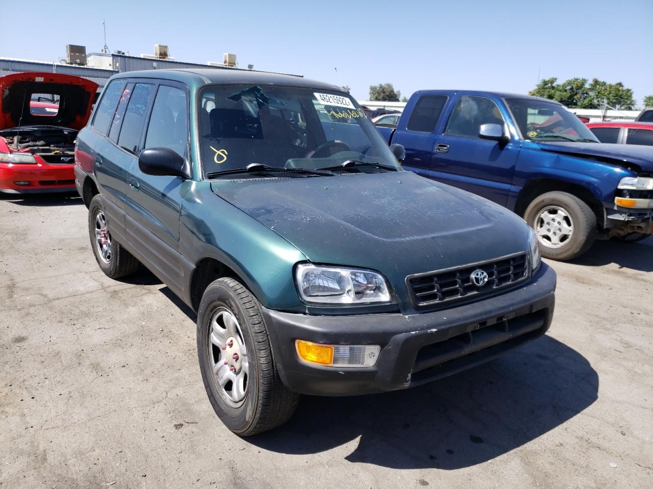 TOYOTA RAV4 1998 with VIN JT3GP10V5W7032944 - Photo from auction