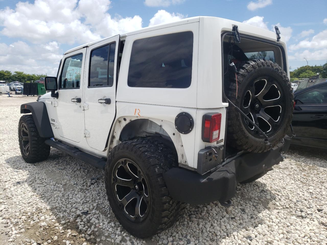 Photo 3 from auction – 2012 JEEP WRANGLER U with VIN 1C4BJWDG6CL135597