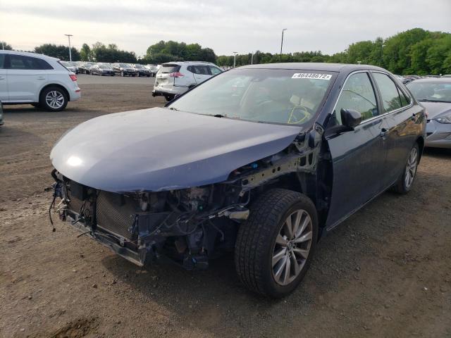 Photo 2 from auction – 2016 TOYOTA CAMRY HYBR with VIN 4T1BD1FK3GU182772