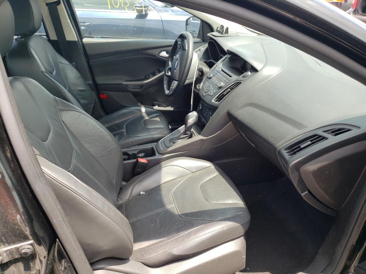 Photo 18 from auction – 2015 FORD FOCUS SE with VIN 1FADP3F24FL277822