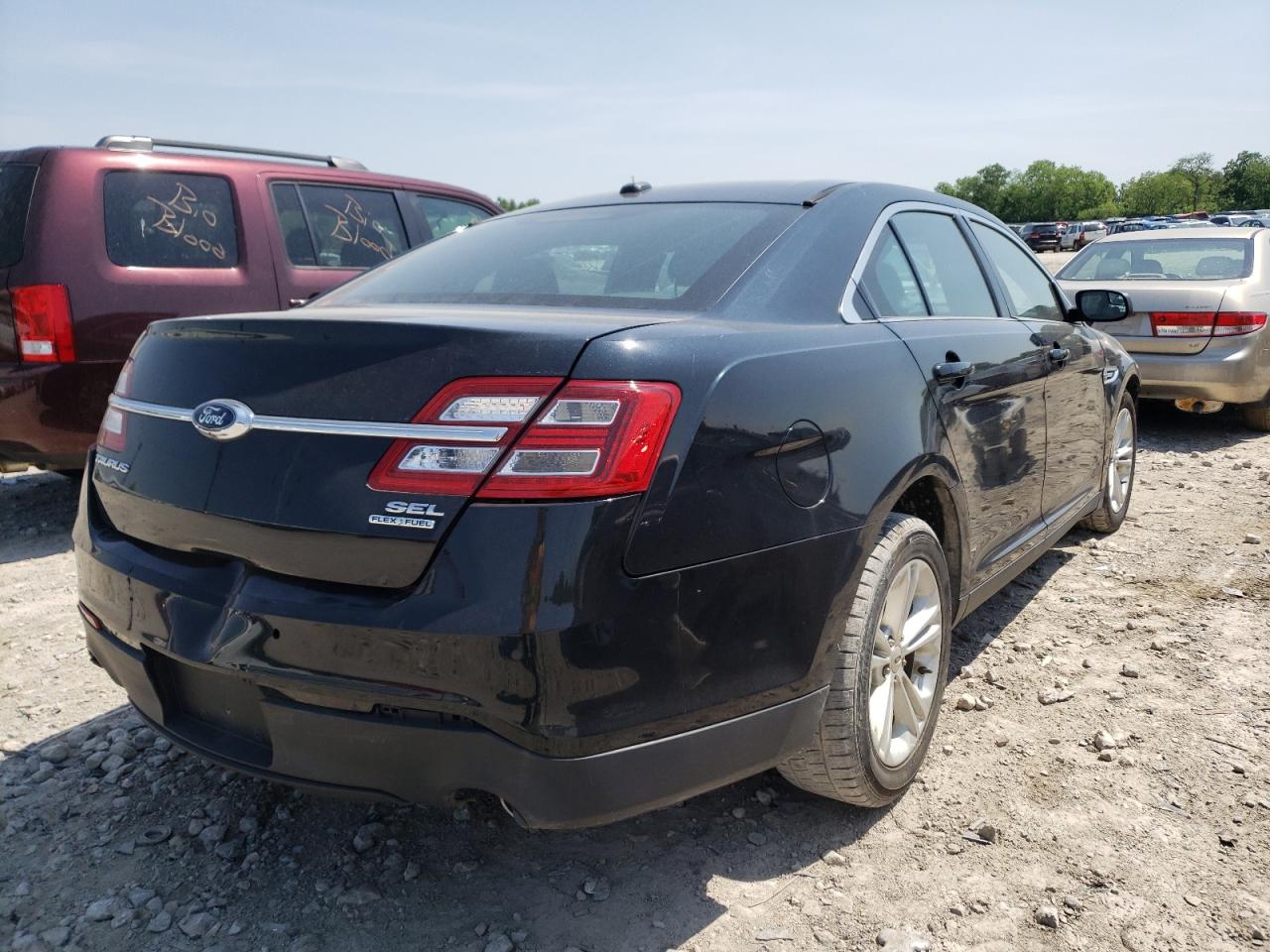 Photo 4 from auction – 2014 FORD TAURUS SEL with VIN 1FAHP2E82EG150821