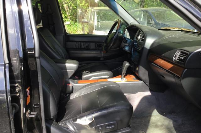 Photo 5 from auction – 2003 INFINITI QX4 with VIN JNRDR09Y33W302965