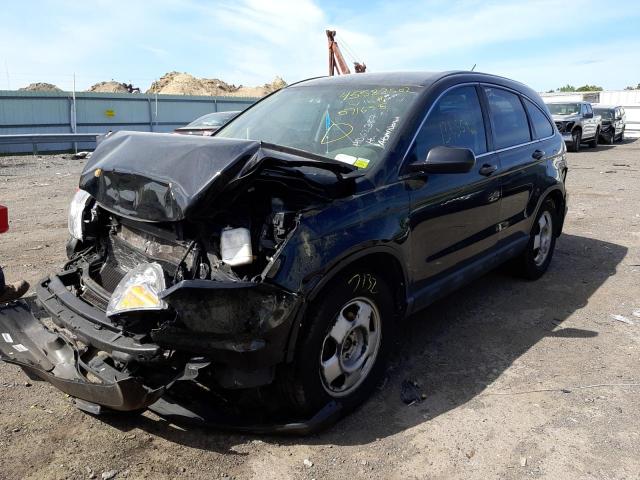 Photo 2 from auction – 2011 HONDA CR-V LX with VIN 5J6RE4H33BL071655