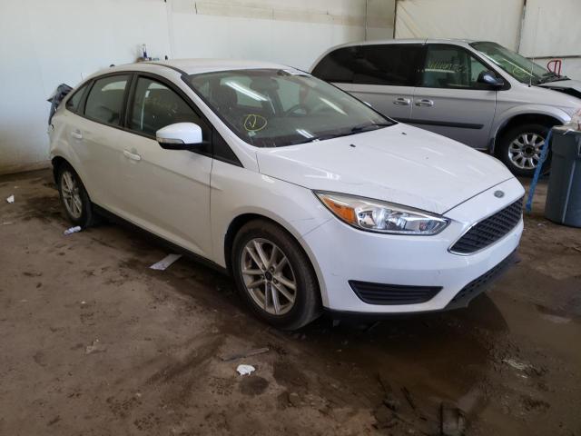 FORD FOCUS SE 2015 with VIN 1FADP3F29FL293174 - Photo from auction