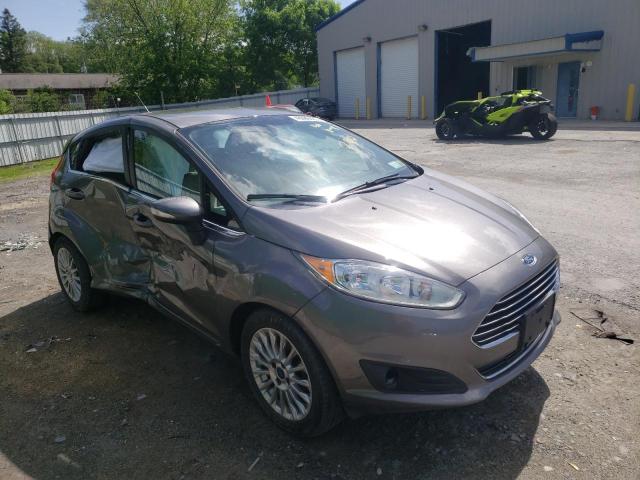FORD FIESTA TIT 2014 with VIN 3FADP4FJ4EM232499 - Photo from auction