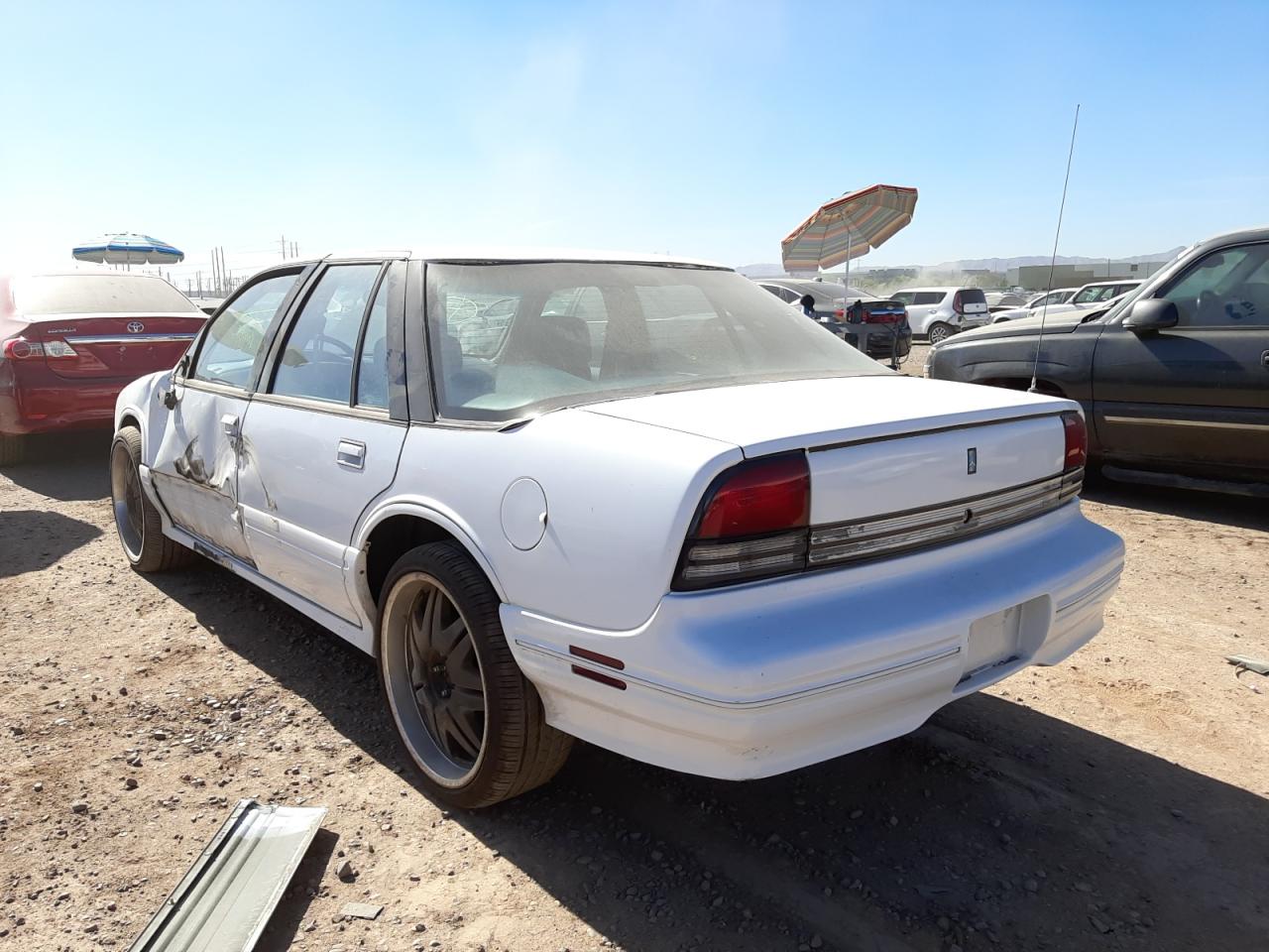 Photo 3 from auction – 1995 OLDSMOBILE CUTLASS SU with VIN 1G3WH52M6SD309404