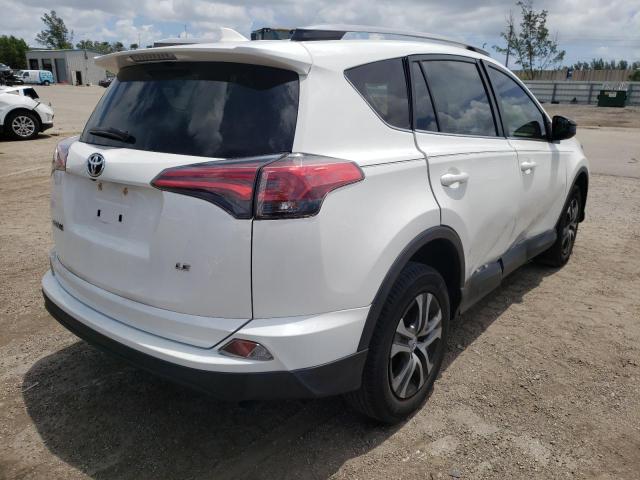 Photo 4 from auction – 2018 TOYOTA RAV4 LE with VIN JTMZFREV8JD131184