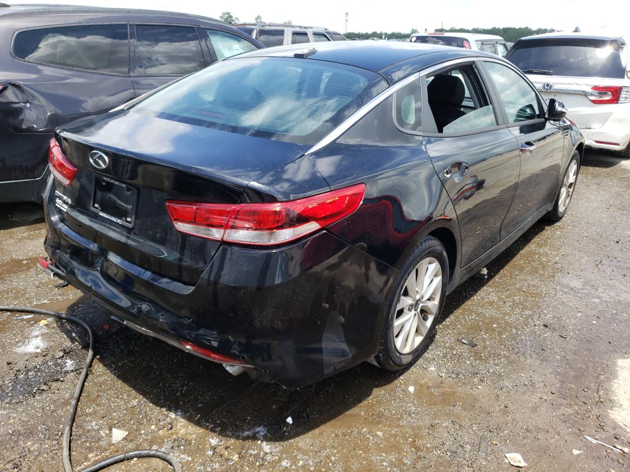 Photo 17 from auction – 2016 KIA OPTIMA LX with VIN 5XXGT4L38GG036899