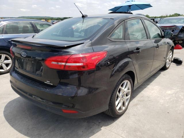 Photo 6 from auction – 2015 FORD FOCUS SE with VIN 1FADP3F24FL277822