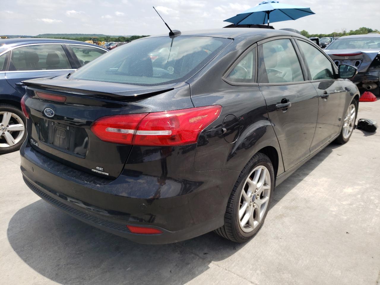Photo 16 from auction – 2015 FORD FOCUS SE with VIN 1FADP3F24FL277822