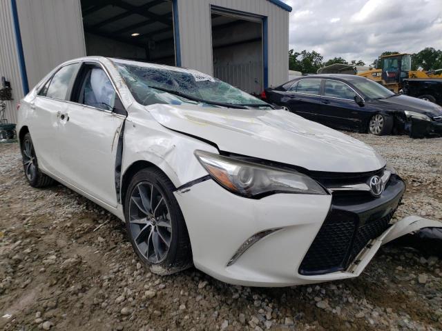 TOYOTA CAMRY LE 2017 with VIN 4T1BF1FK4HU274890 - Photo from auction