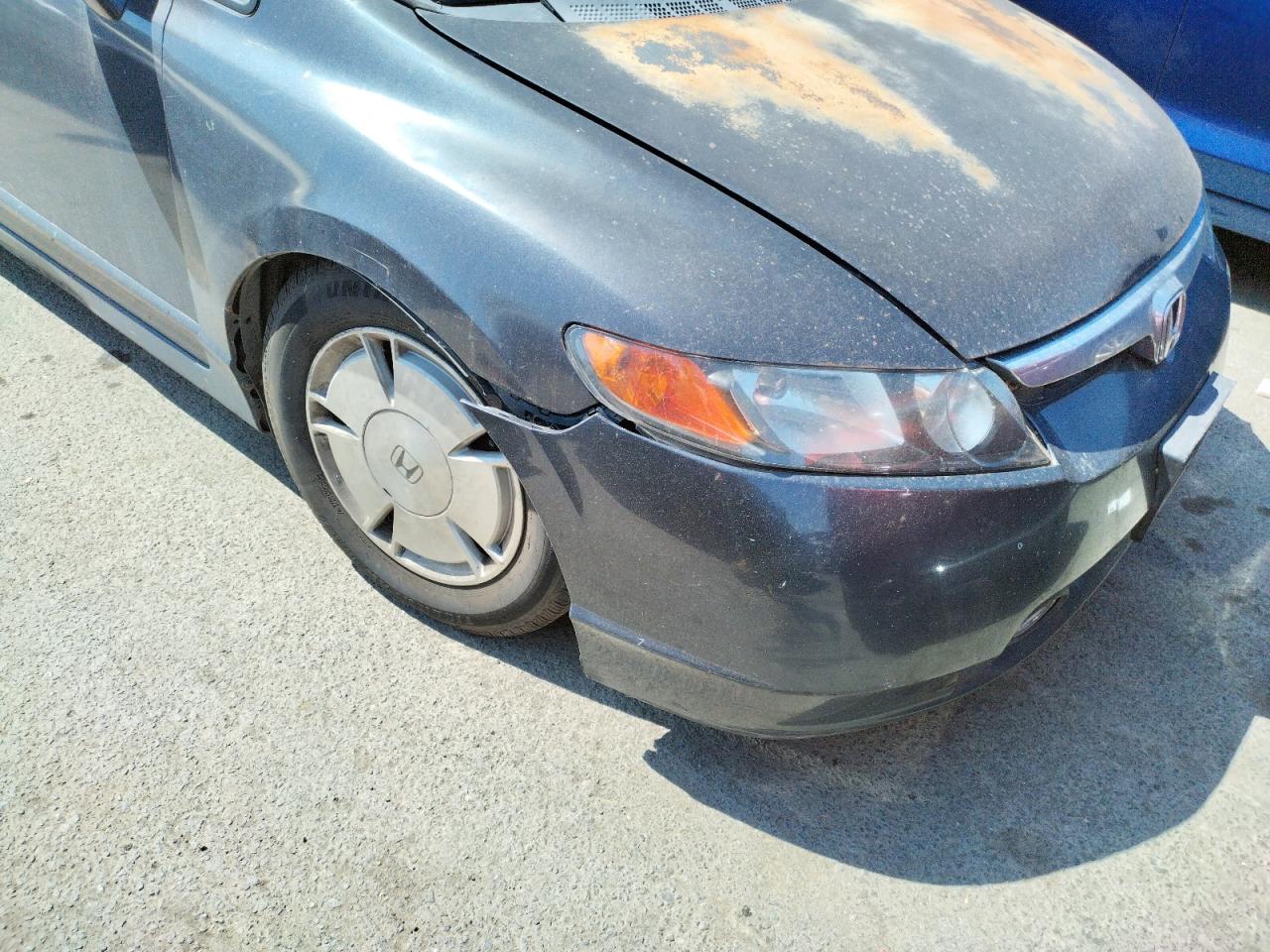 Photo 9 from auction – 2007 HONDA CIVIC HYBR with VIN JHMFA36297S017765