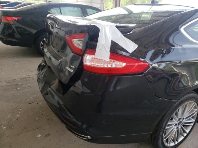 Photo 9 from auction – 2014 FORD FUSION SE with VIN 3FA6P0H94ER243607