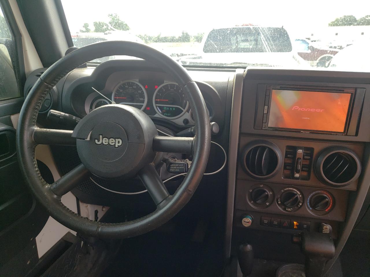 Photo 9 from auction – 2007 JEEP WRANGLER R with VIN 1J4GA69167L128093