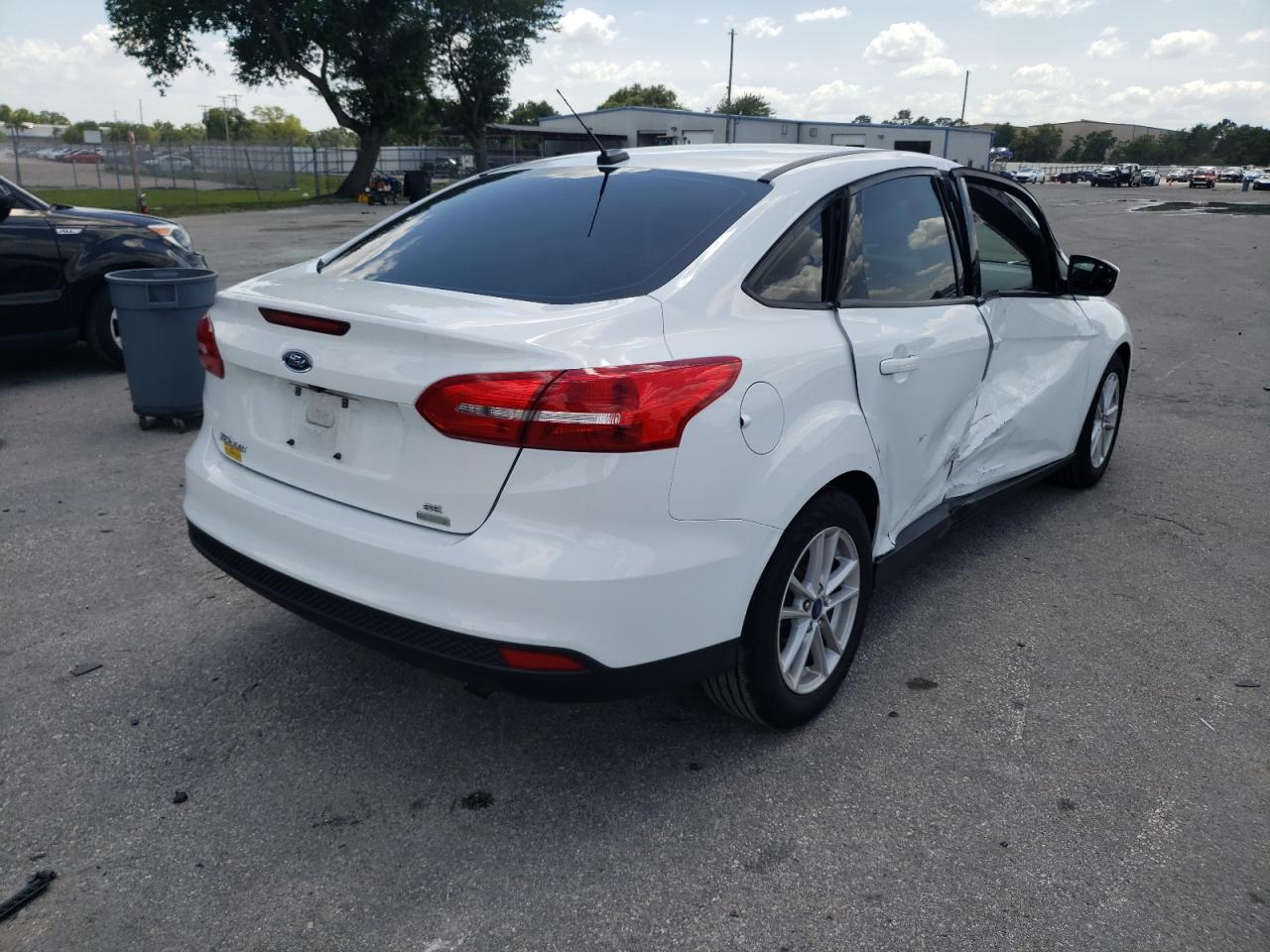Photo 4 from auction – 2018 FORD FOCUS SE with VIN 1FADP3FE7JL235535