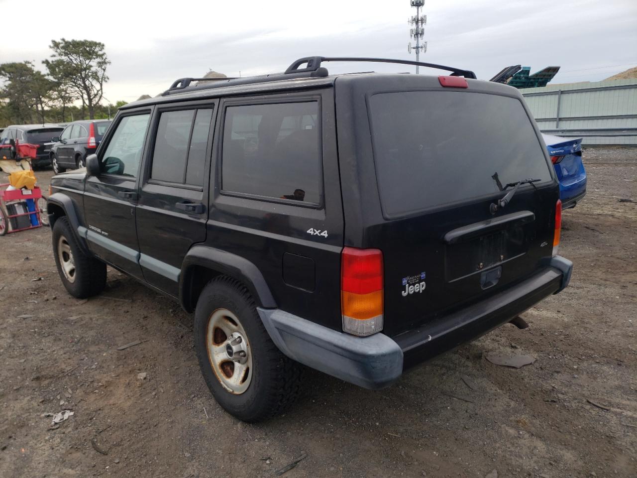 Photo 3 from auction – 1999 JEEP CHEROKEE with VIN 1J4FF68S1XL657345