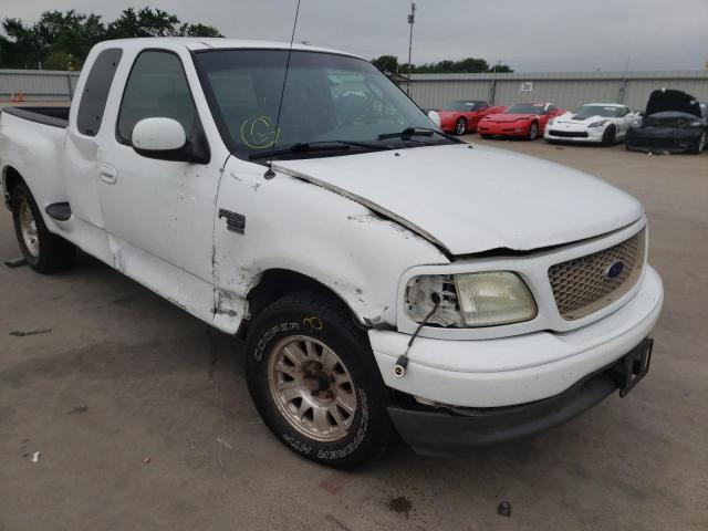 Photo 9 from auction – 2002 FORD F150 with VIN 2FTRX07W52CA55889