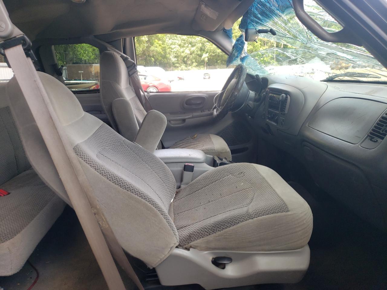 Photo 18 from auction – 1999 FORD F150 with VIN 1FTRX18L8XKC25353