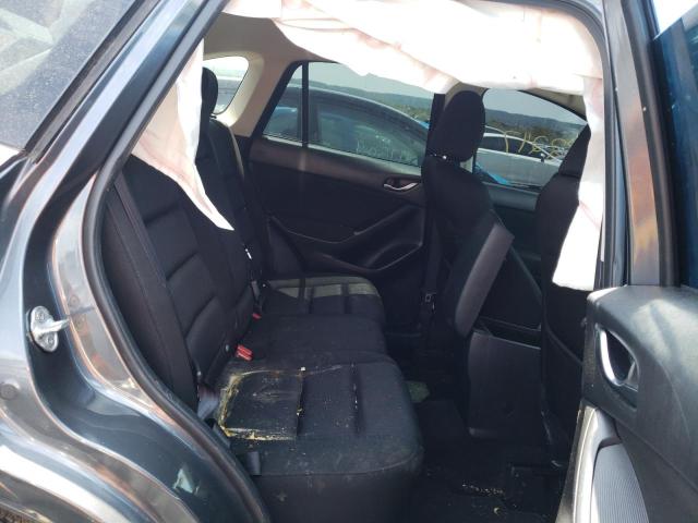 Photo 6 from auction – 2013 MAZDA CX-5 TOURI with VIN JM3KE4CE7D0141590
