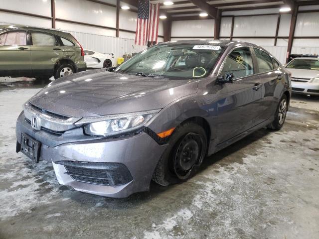 Photo 2 from auction – 2018 HONDA CIVIC LX with VIN 2HGFC2F54JH502833